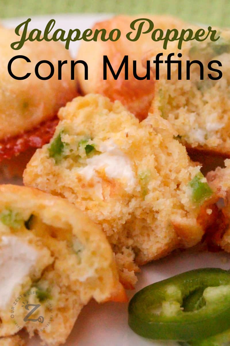 Mini Jalapeno Popper Corn Muffins with a cream cheese center and sliced jalapenos on the side