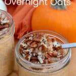 Pumpkin Overnight Oats with pecans in a jar with pumpkins in the background
