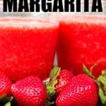 close up of two glasses of fresh strawberry margarita with fresh strawberries in front
