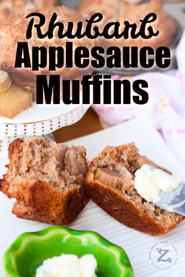 tender rhubarb applesauce muffins with butter and a green butter dish on a white plate and with muffins in the background