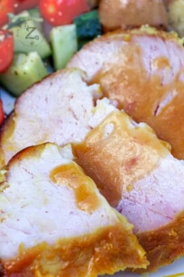 close up of oven baked ham with pineapple glaze