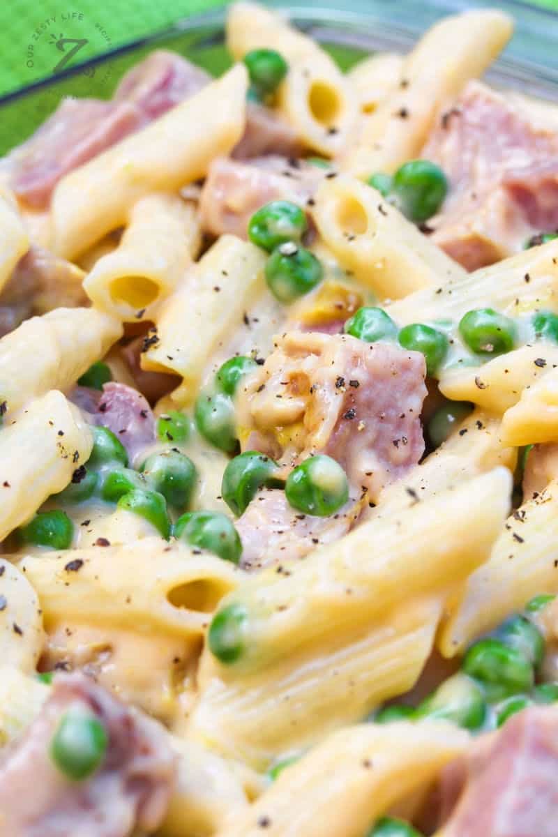 close up of ham and peas pasta bake with penne pasta