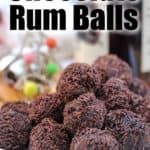 Chocolate rum balls with chocolate sprinkles on a plate
