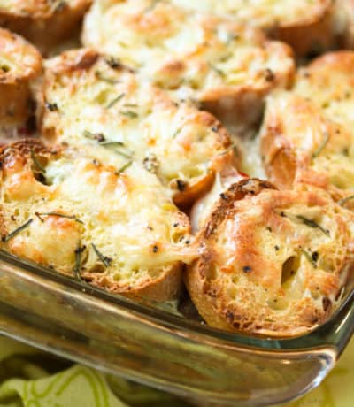 Breakfast strata with sausage baked in a glass dish.