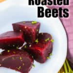 a close up of red beets on a white plate cut into 5 pieces