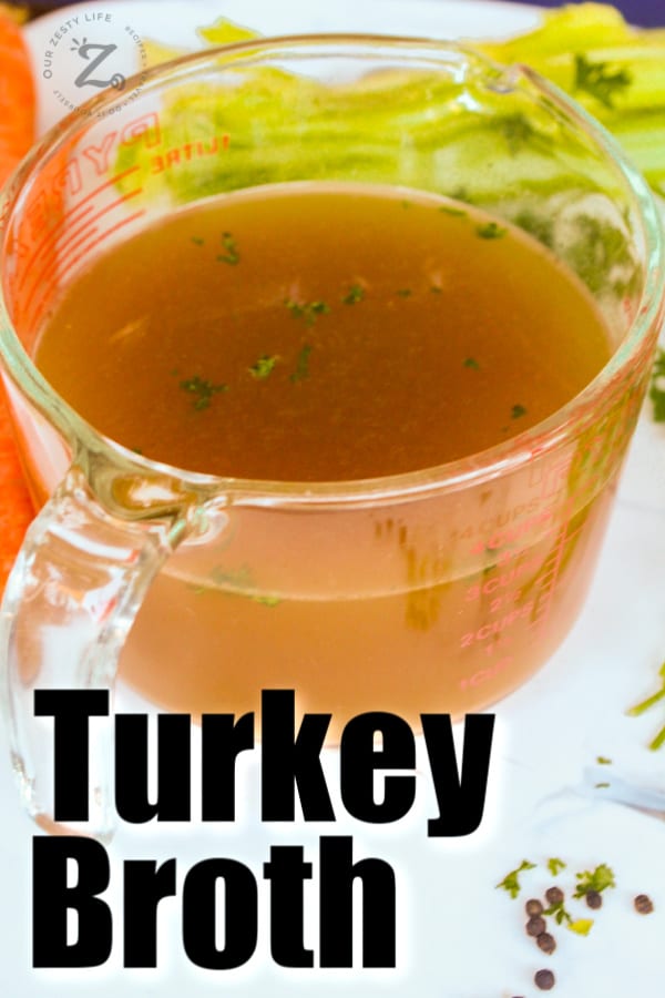 overhead view of turkey broth in a Pyrex container