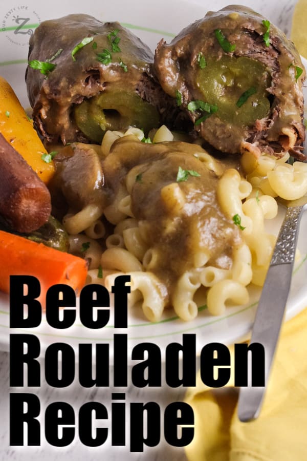 Beef Rouladen on a plate with writing