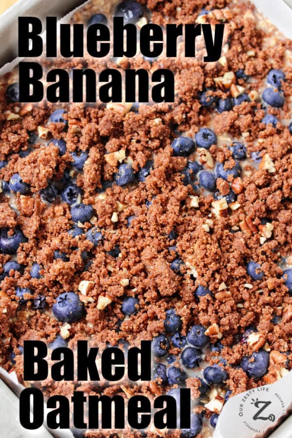 Blueberry banana baked oatmeal in a pan with parchment paper