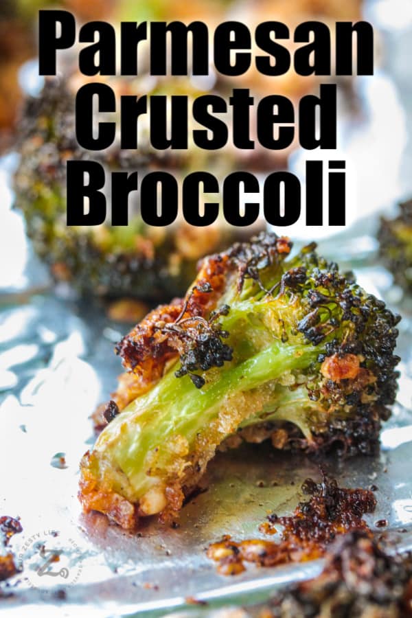close up of Parmesan Roasted Broccoli on foil with a title