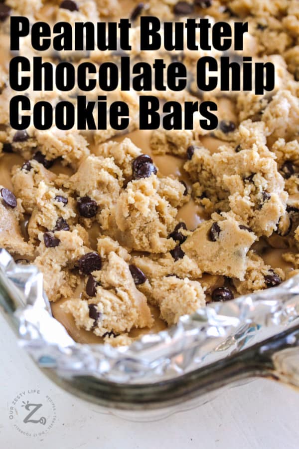 Raw Peanut Butter Chocolate Chip Bars in a dish with writing