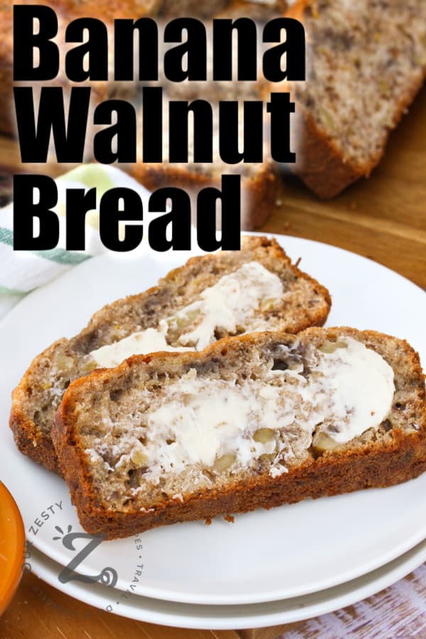slices of Banana Walnut Bread on a plate with the loaf in the background with writing