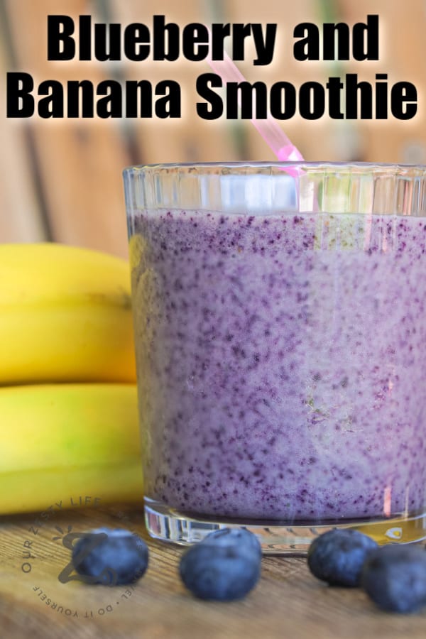 Blueberry Banana Smoothie in a glass with blueberries and bananas on the side with a title
