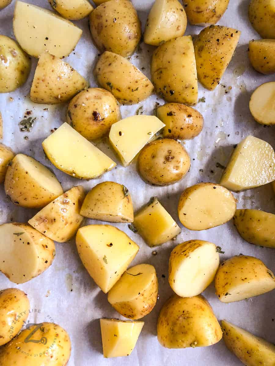 seasoning on top of potatoes before cooking to make Oven Roasted Potatoes