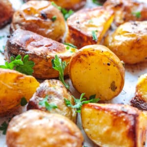 close up of Oven Roasted Potatoes on a baking sheet