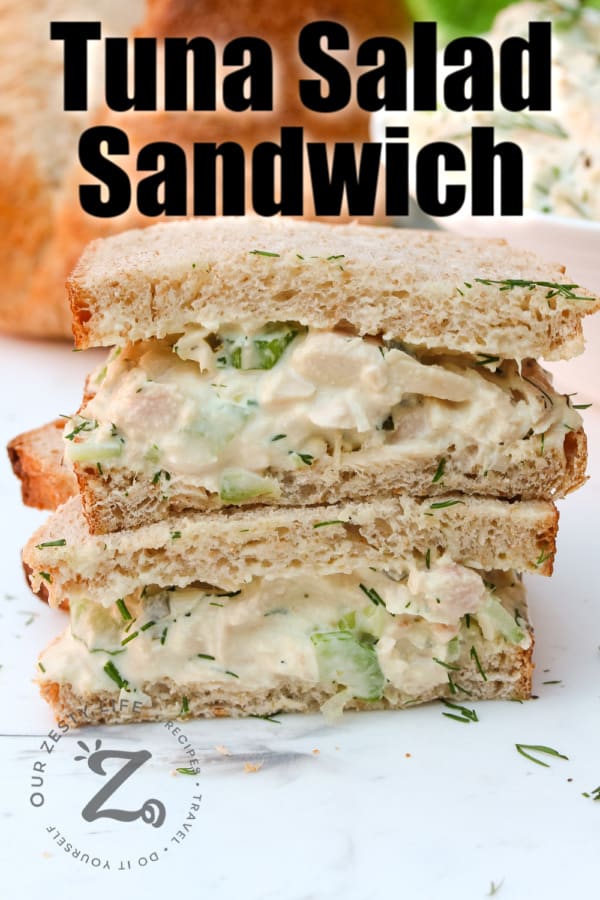 Tuna Salad Sandwich cut in half with writing