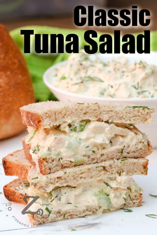 Tuna Salad on bread with bowl of tuna salad in background with a title