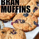 close up of baked Blueberry bran muffins with writing