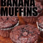 Chocolate Banana Muffins on a table with writing