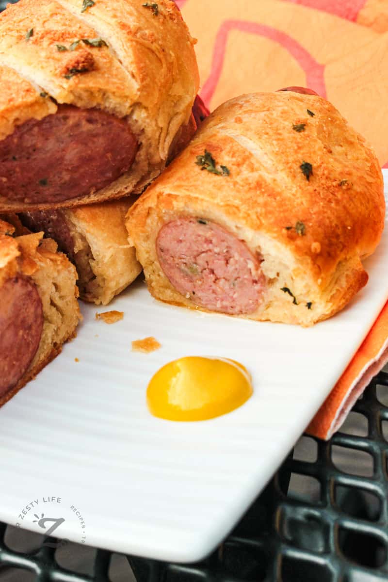 cut Sausage Crescent Rolls with mustard