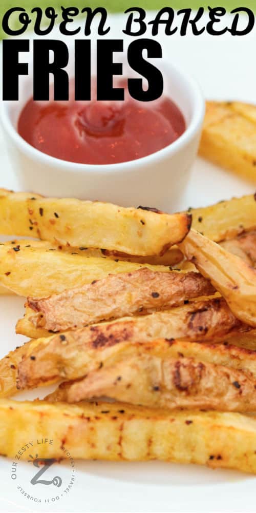 Oven Baked Fries on a plate with ketchup and writing