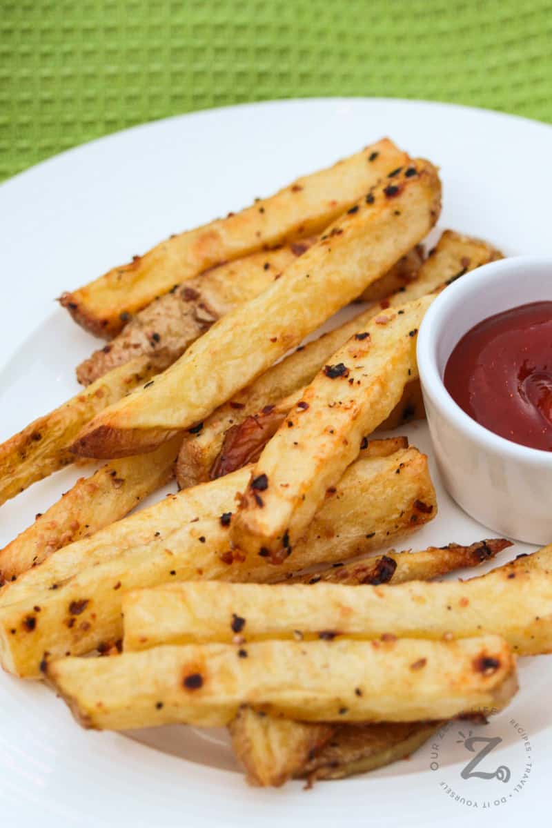 Oven Baked Fries on a plate with ketchup