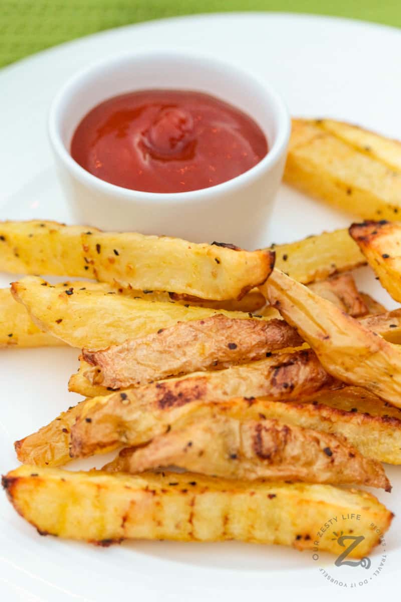close up of Oven Baked Fries on a plate with ketchup