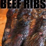 close up of smoked beef ribs with a title