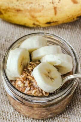 Banana Overnight Oats Recipe in a jar with bananas