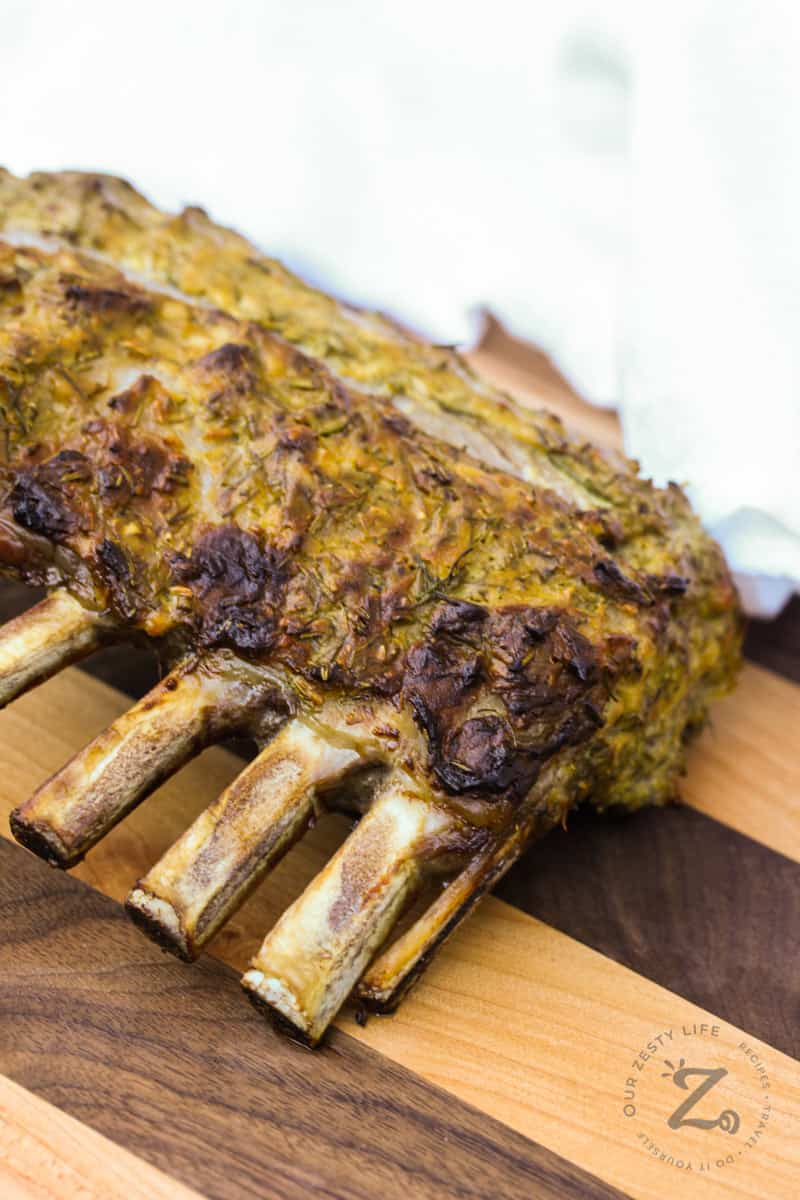 rack of lamb on cutting board before slicing to make Lamb Popsicles