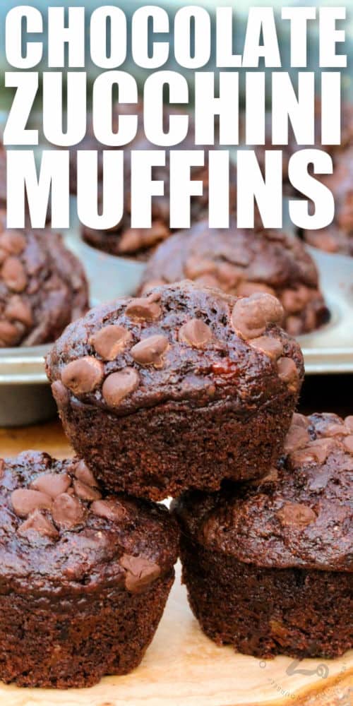 Chocolate Zucchini Muffins with a muffin tin full in the background with a title