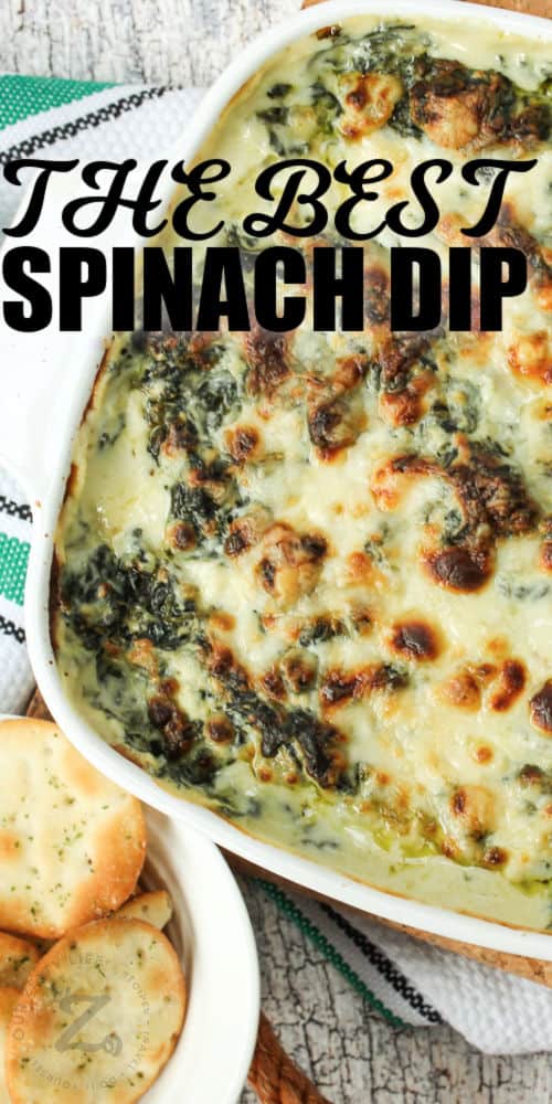 Hot Spinach Dip in a dish with writing