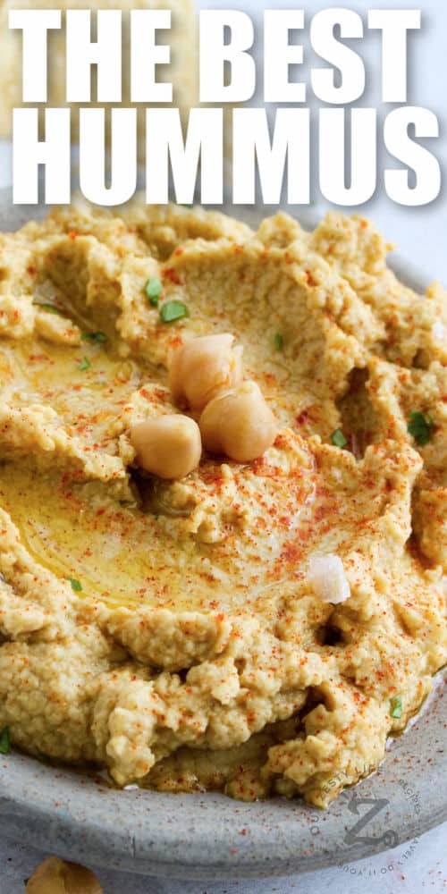 close up of Hummus with writing