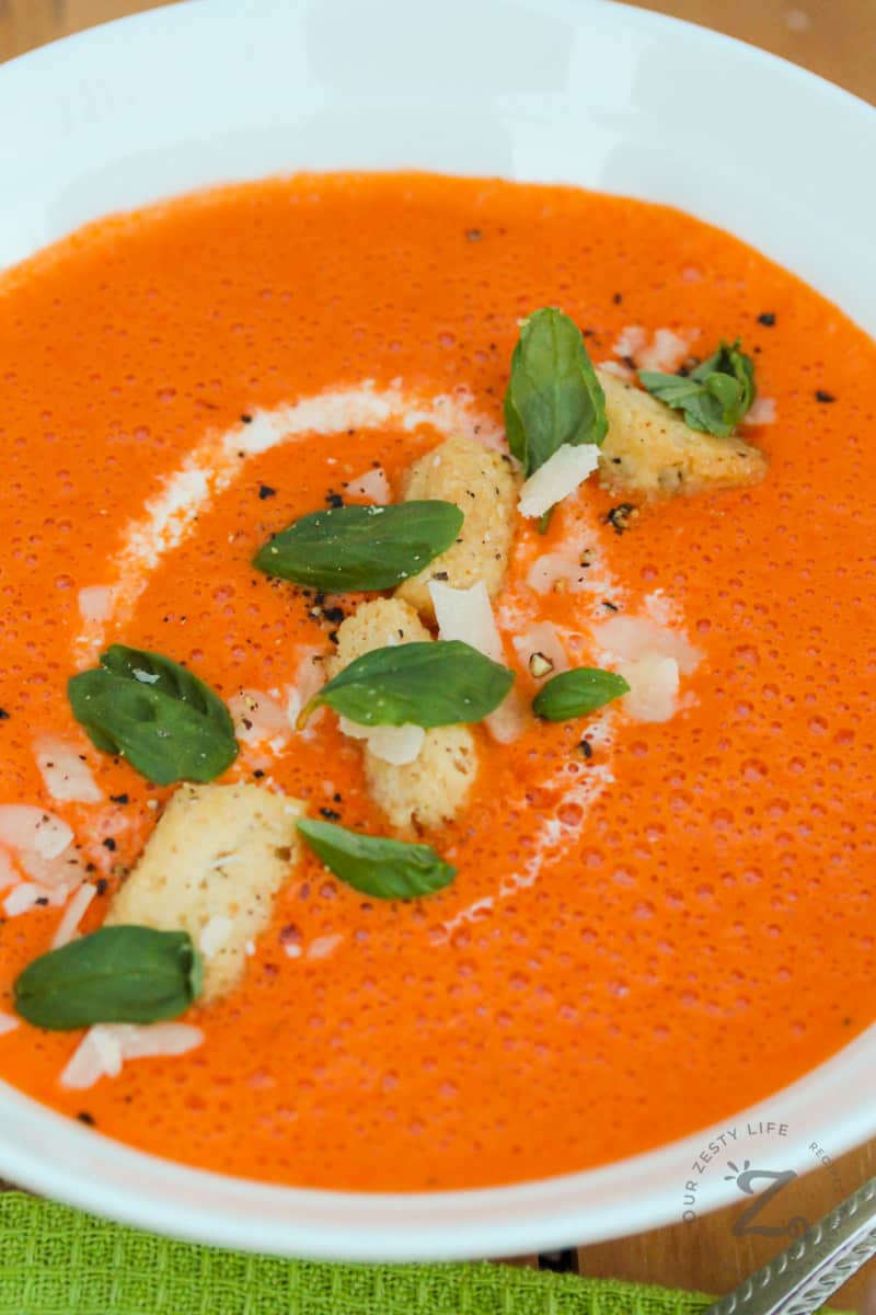 close up of Creamy Tomato Soup with croutons