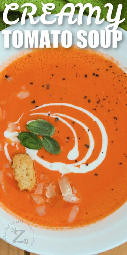 top view of a bowl of Creamy Tomato Soup with writing