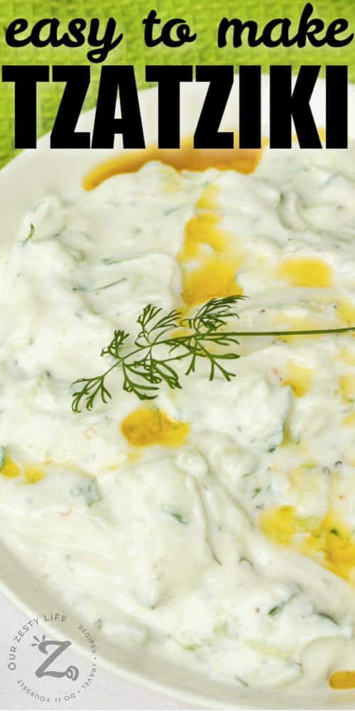 Tzatziki in a bowl with garnish and writing