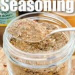 spoonful of Jerk Seasoning Recipe in a har with ingredients and a title