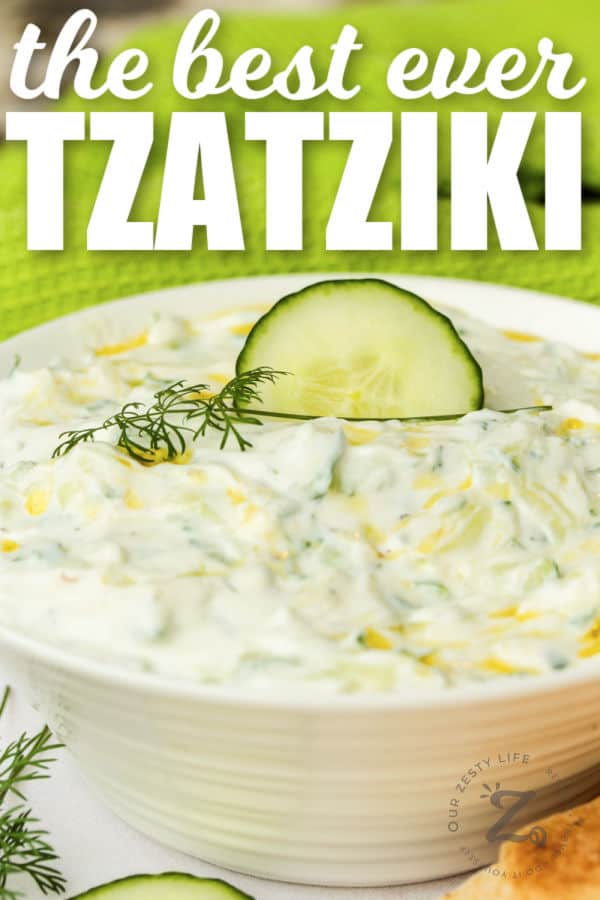 Tzatziki with cucumber in a bowl with a title