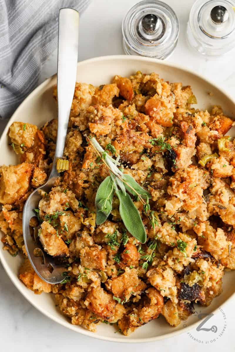 Sourdough Stuffing with a spoon and salt and pepper shakers