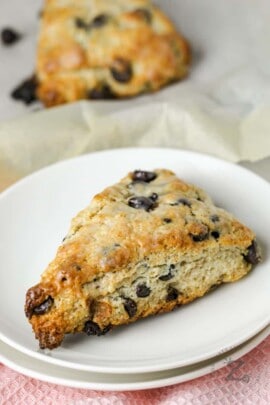 Chocolate Chip Sourdough Scones plated and on a baking sheet