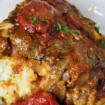 plated Swiss Steak with writing