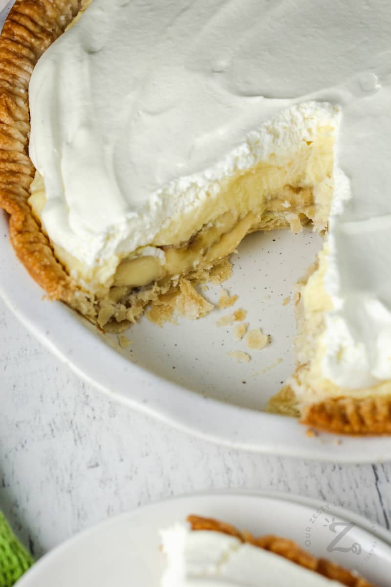 Banana Cream Pie with a slice taken out