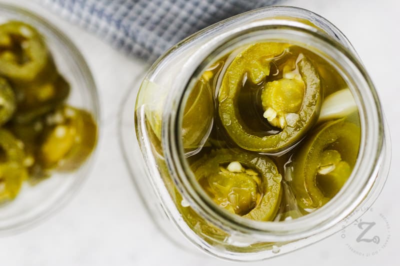 top view of Instant Pot Quick Pickled Jalapenos in a jar