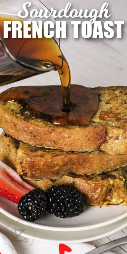 close up of syrup being poured over top Sourdough French Toast