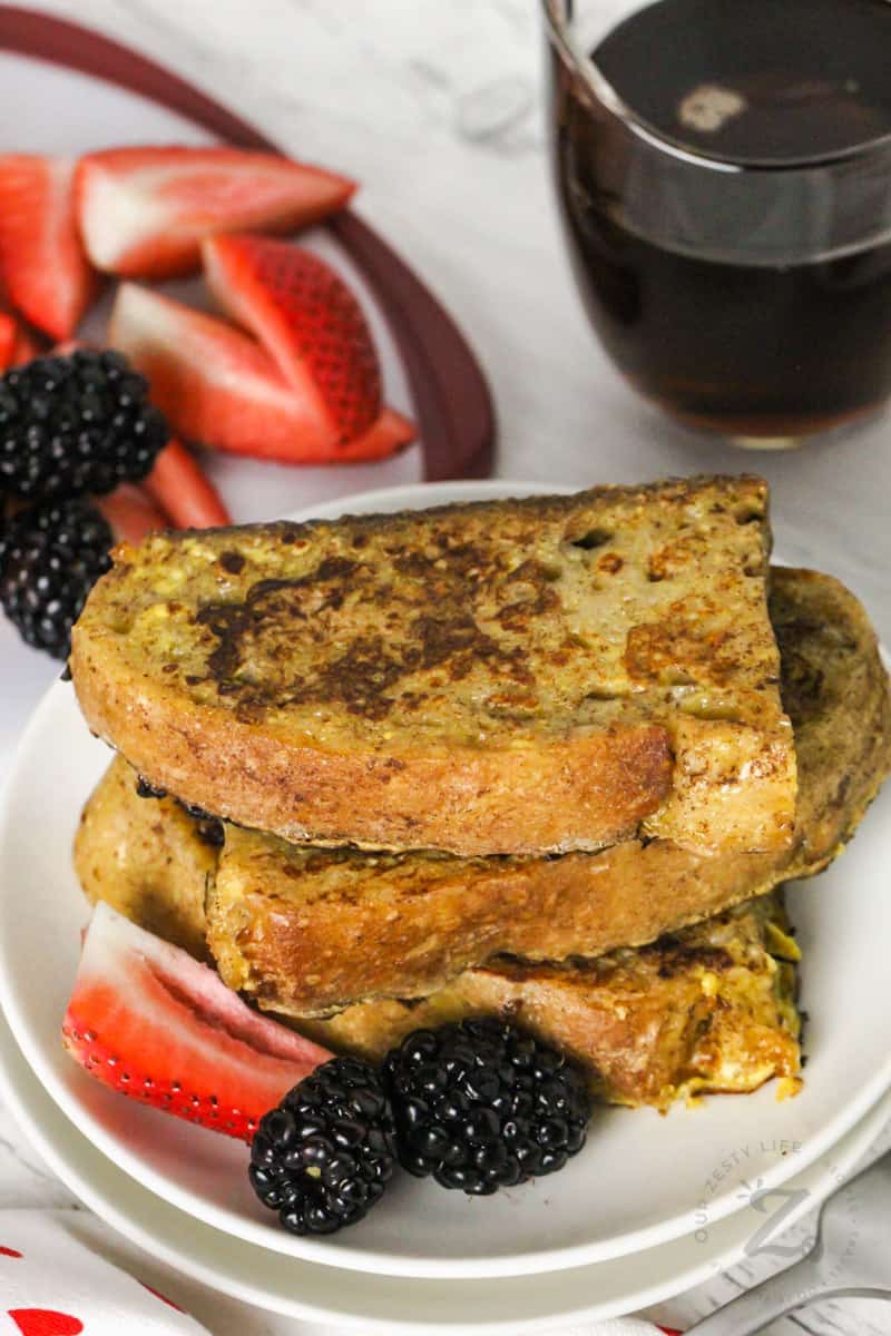 Sourdough French Toast on a plate with berries