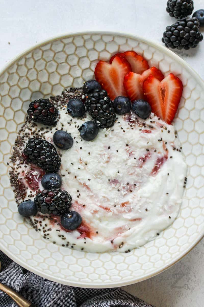 top view of Yogurt Bowl with berries around it