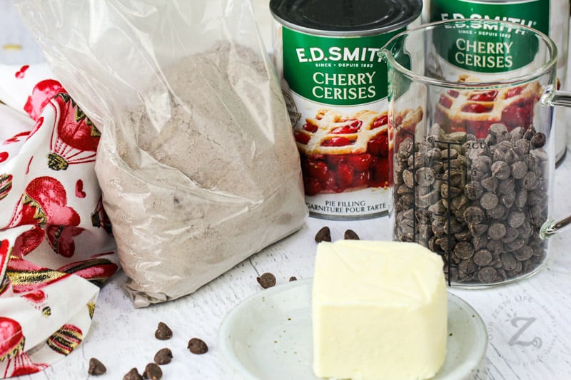 ingredients on a table to make Chocolate Cherry Dump Cake