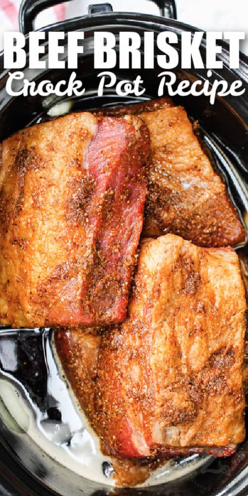 Beef Brisket Slow Cooker Recipe in a crock pot with a title