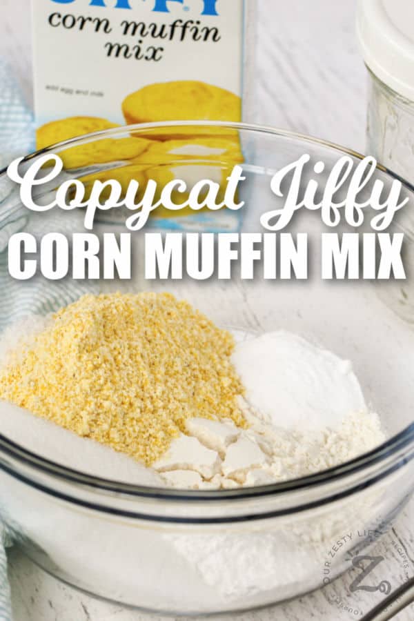 Copycat Jiffy Muffin Mix in a glass bowl with writing