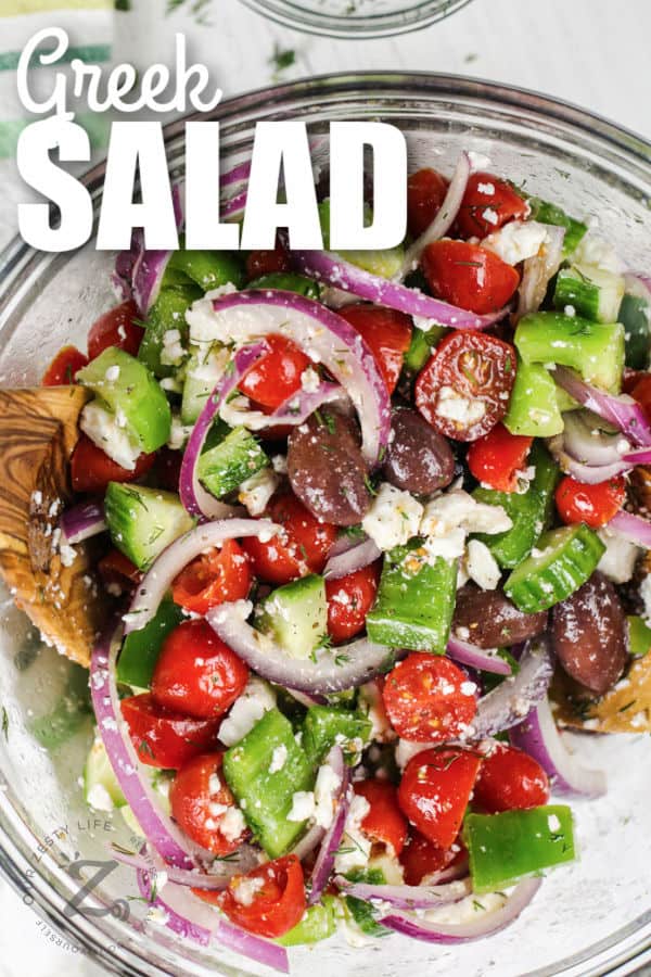 Greek Salad in a bowl with writing