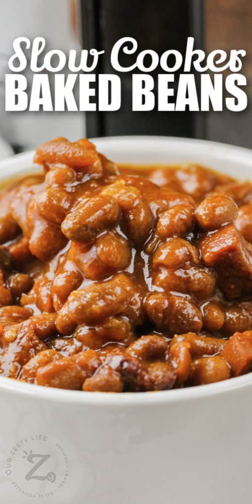 close up of Easy Slow Cooker Baked Beans with writing